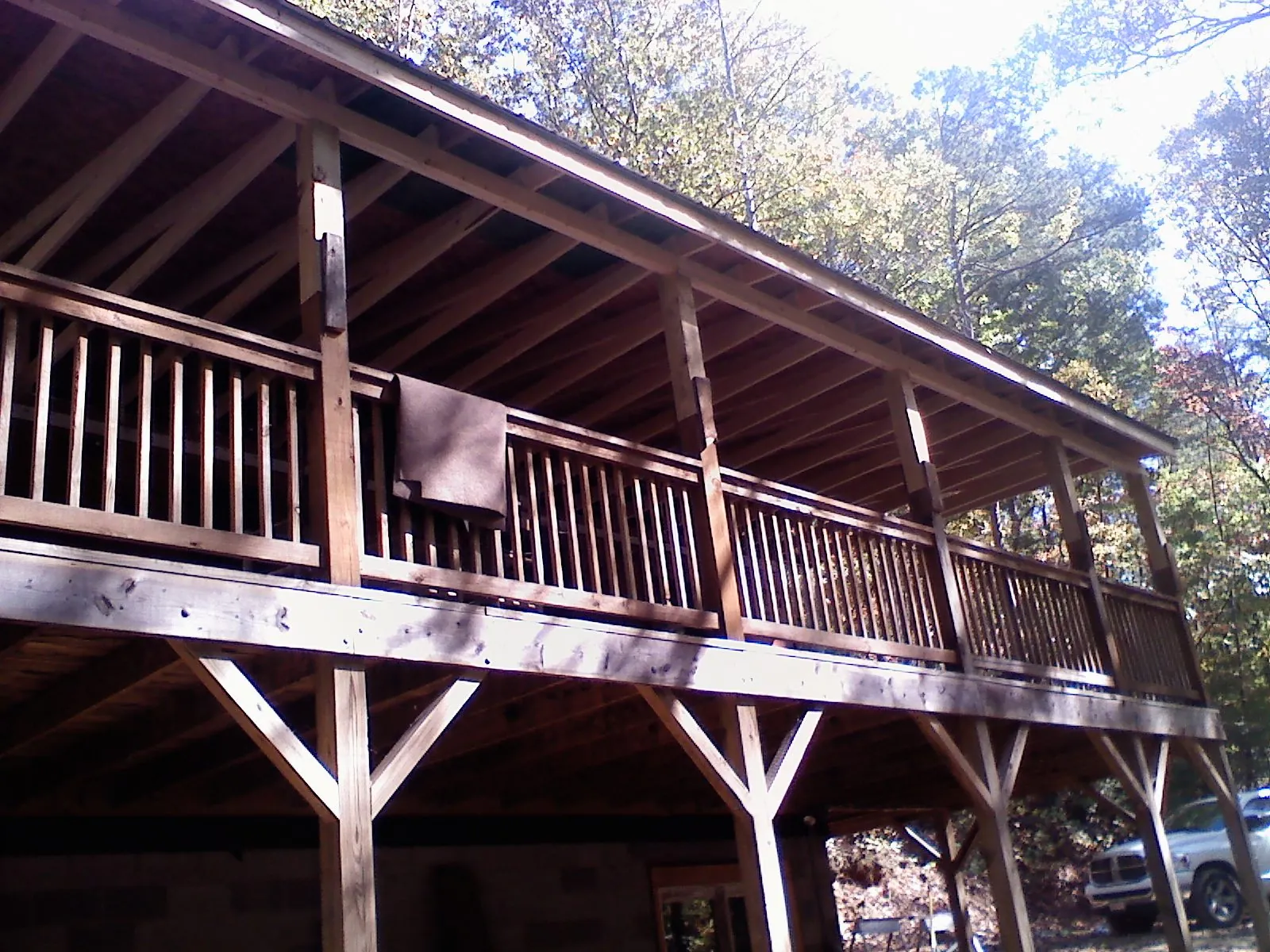 Timber framing under a new elevated porch and deck — Roof Leak Repair in Mound Valley by Roofing Brothers